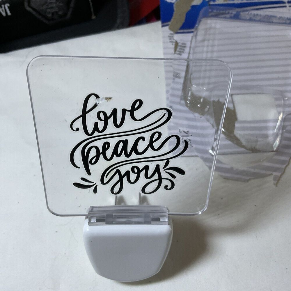 Night light wall plug ins! Love Peace Joy Saying